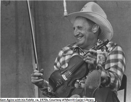 Agins_during_a_performance_with_his_fiddle_1970s.jpg