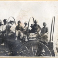 Ten_people_in_a_wagon_in_Orderville.jpg