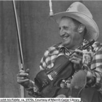 Agins_during_a_performance_with_his_fiddle_1970s.jpg